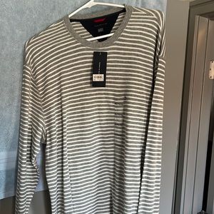 Tommy Hilfiger throw over sweater.